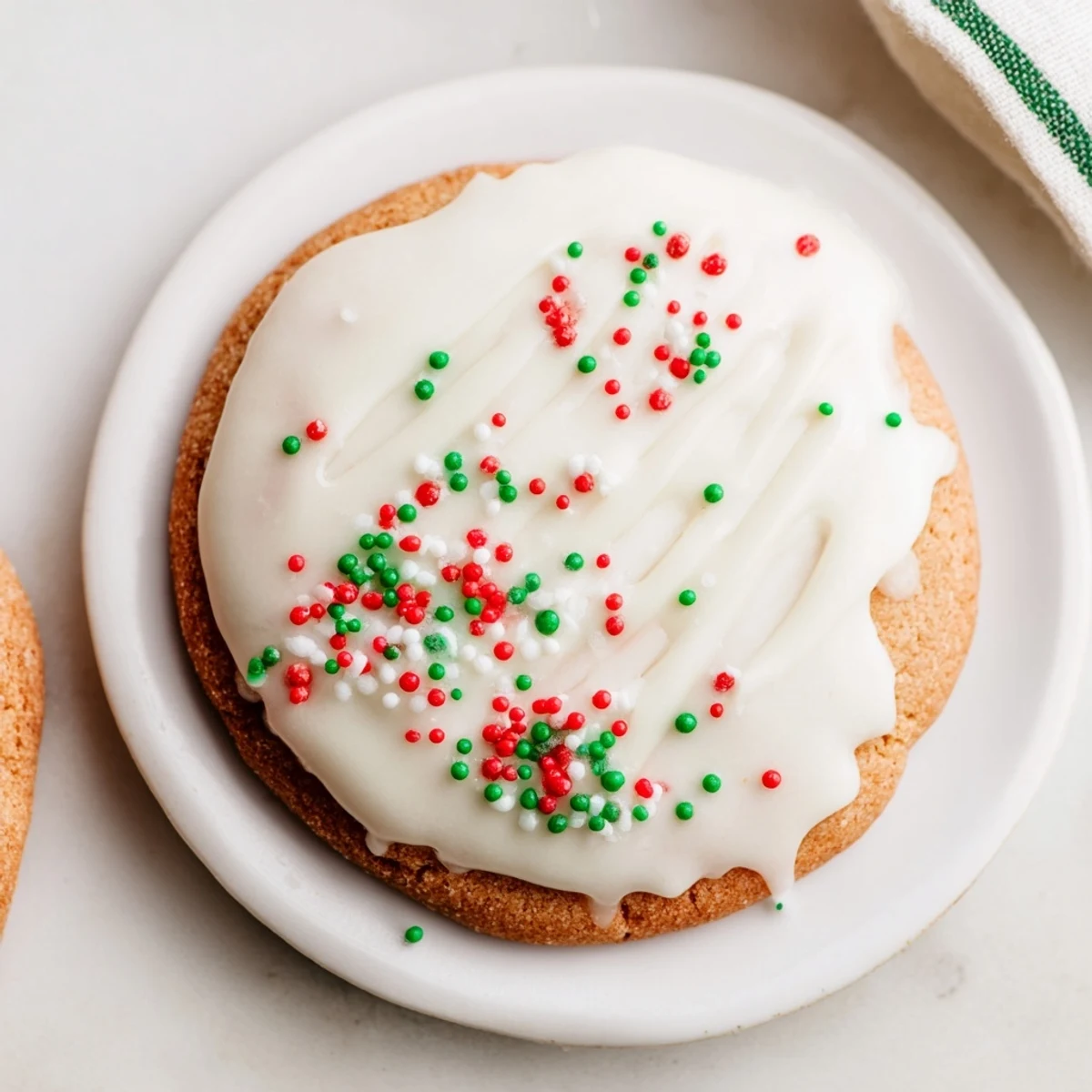 Golden brown Holiday Cookies with Icing Drizzle, drizzled with sweet white icing, ready for sharing.
