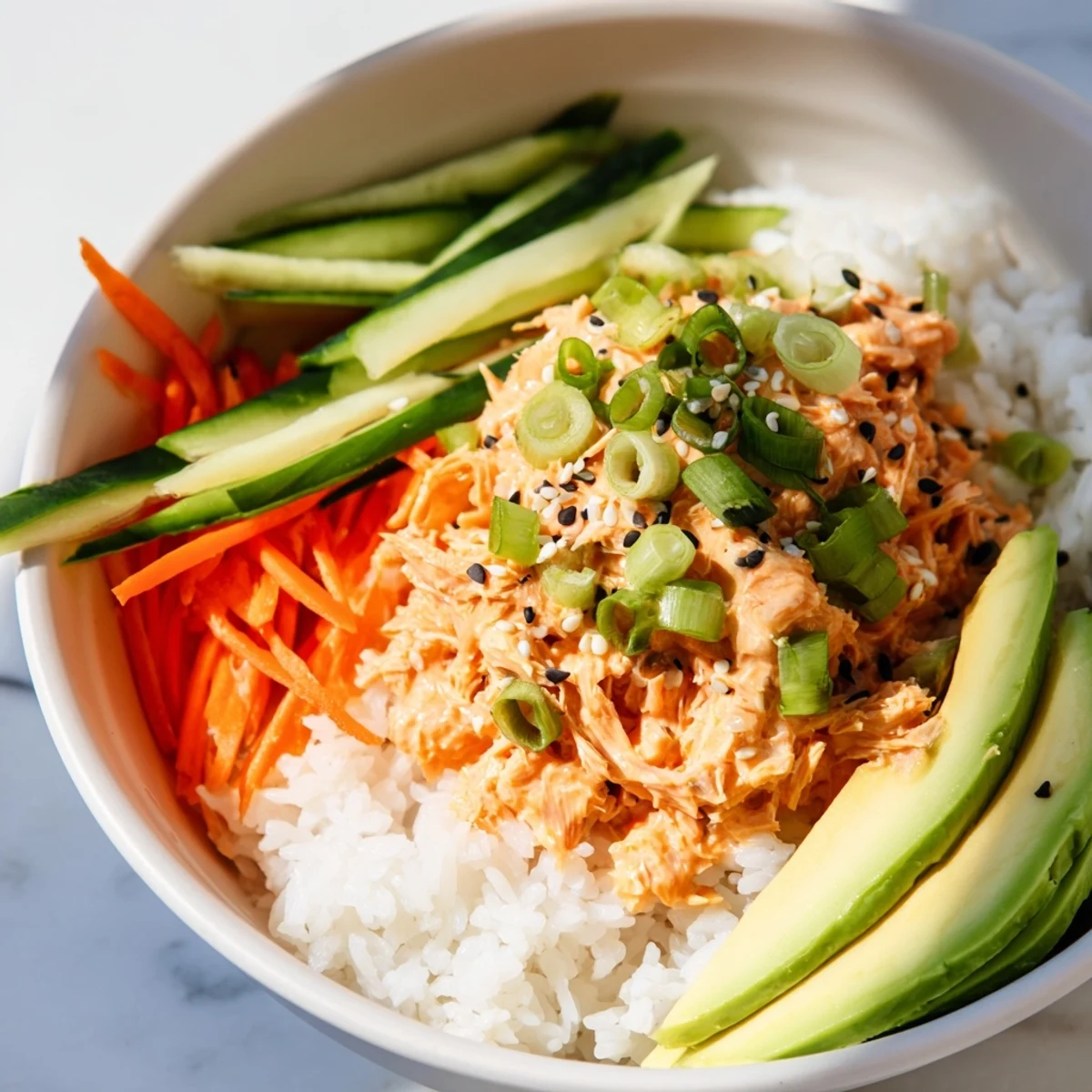Steaming Spicy Canned Salmon Rice Bowl brimming with colorful veggies, ready to enjoy.