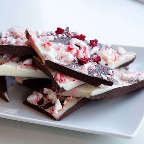 Crisp Peppermint Bark, a delicious holiday treat, ready to be broken into shareable shards.