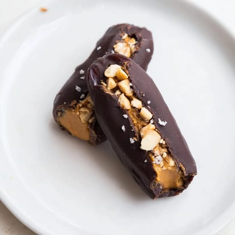 Image: Close-up of homemade Chocolate Date Snickers, a healthier take on your favorite candy bar.