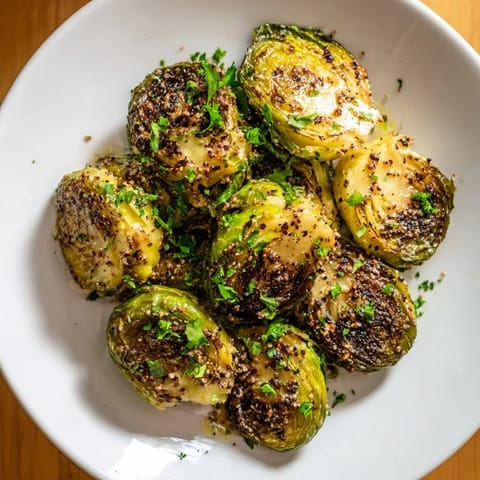 These glazed honey mustard Brussels sprouts are beautifully caramelized, offering a blend of sweet and savory flavors.