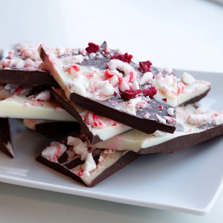Crisp Peppermint Bark, a delicious holiday treat, ready to be broken into shareable shards.