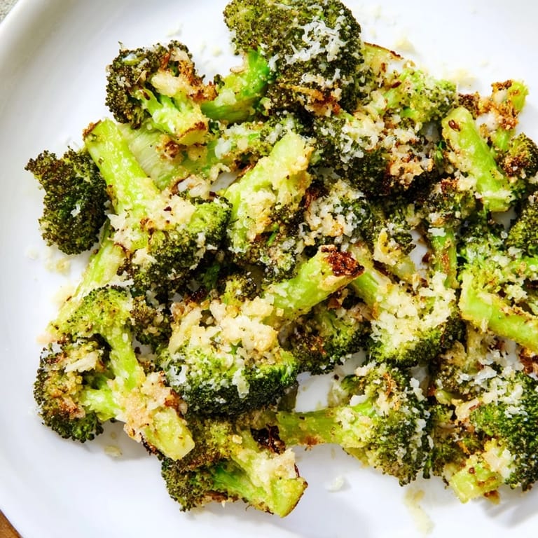 Perfectly browned Garlic Parmesan Roasted Broccoli, smelling of garlic and ready to enjoy.